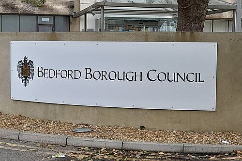 Sign reading Bedford Borough Council outside Borough Hall