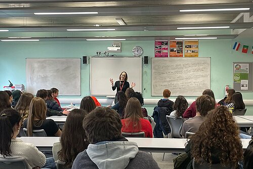 Alison talking to students