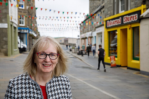 Beatrice Wishart stands on Commercial Street in Lerwick