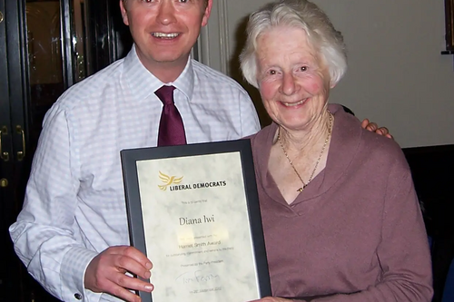 Tim Farron presents the Party's award for lifetime achievement to Diana Iwi