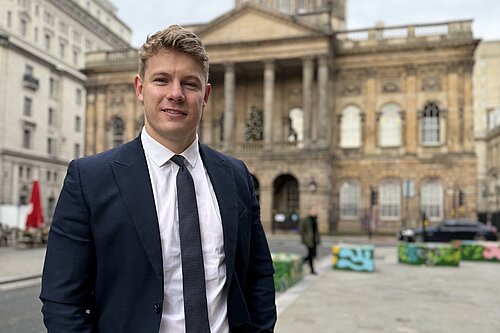 Cllr Carl Cashman outside Liverpool Town Hall