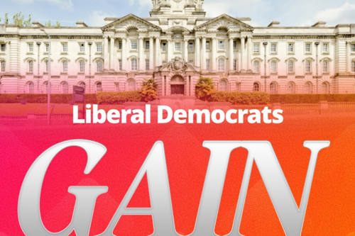 Lib Dems gain control of Stockport - photo of the town hall with text over.
