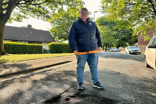 Tom Shaw with a pothole