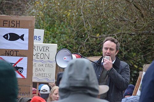 Danny speaking at River protest