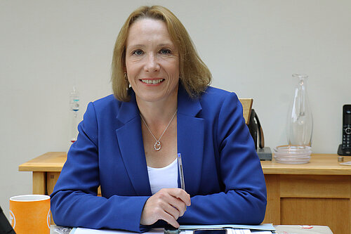 Helen at her desk