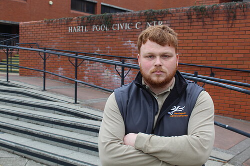 Connor Stallard infront of Hartlepool Borough Council with arms crossed