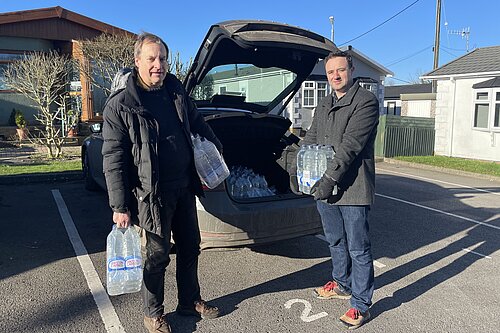 Danny and Jerry Pett with water