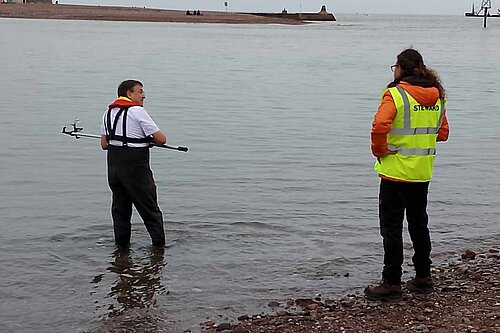 Image of two men seawater testing