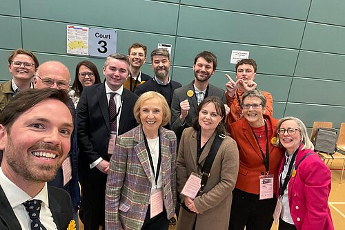 Adam Harley with Susan Murray and a happy group of Lib Dem activists