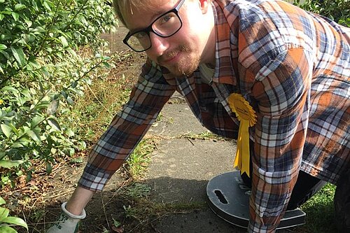 James Hawketts cleaning up North Park Avenue.